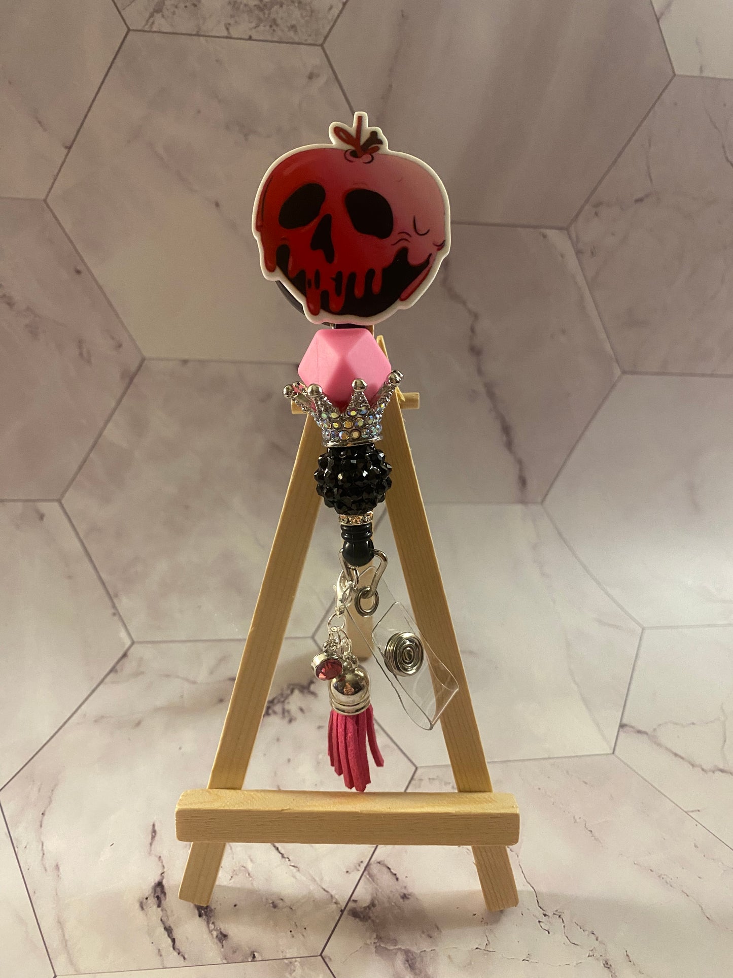 Badge Reel Poison Apple