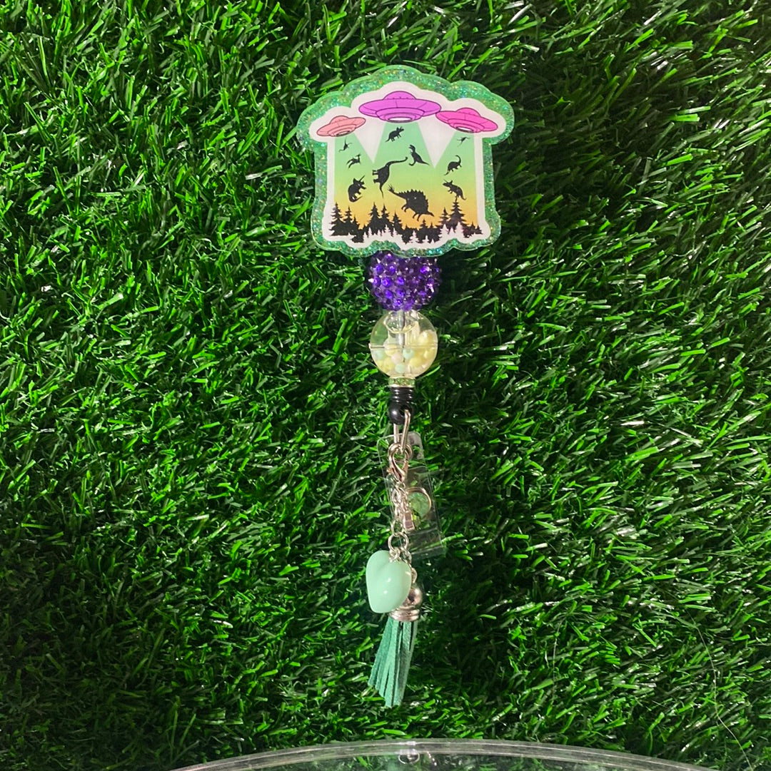 Badge Reel Dino Invasion