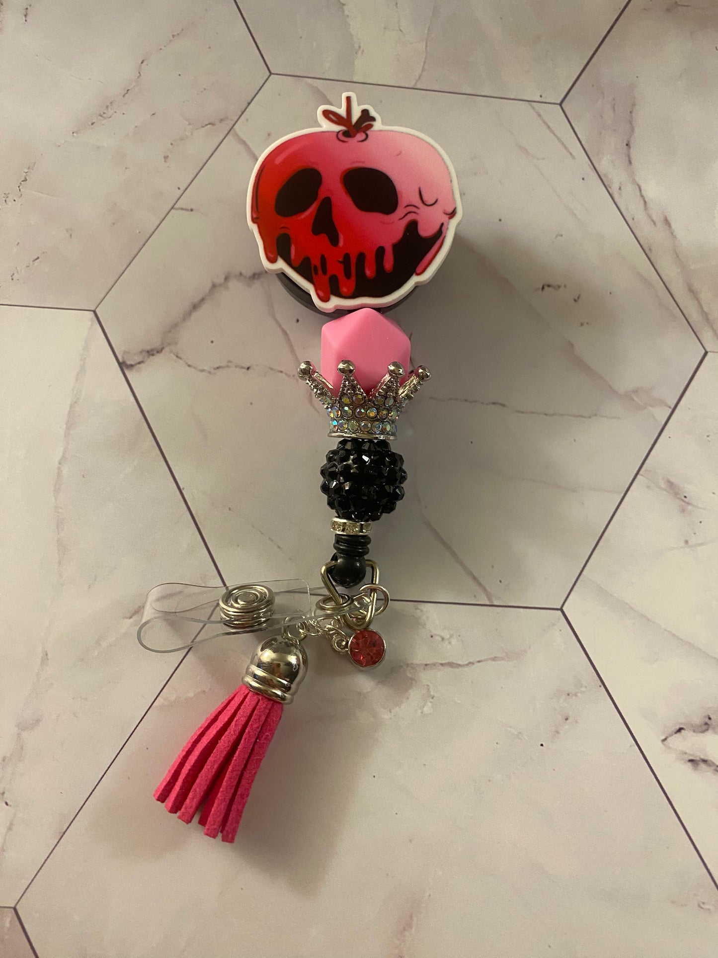Badge Reel Poison Apple
