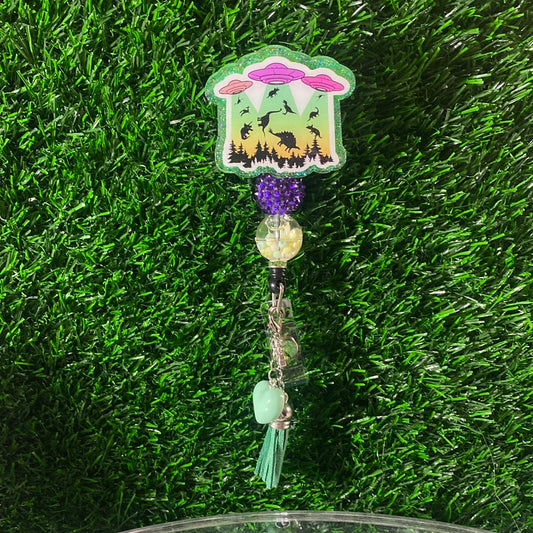 Badge Reel Dino Invasion